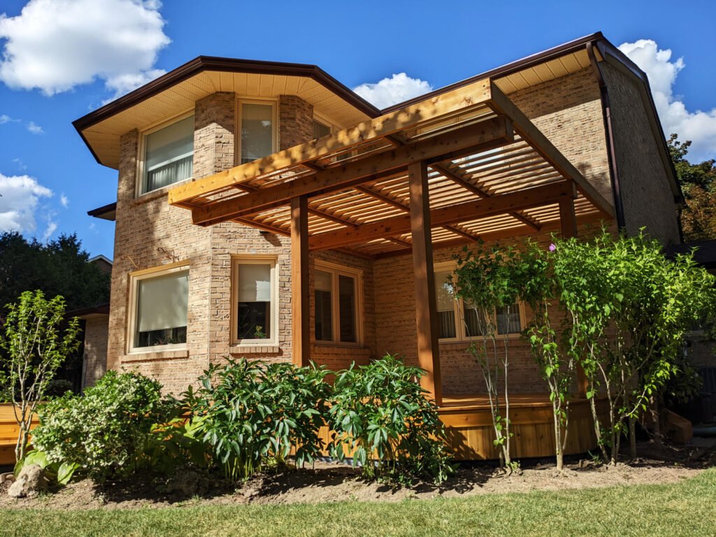 Low level cedar deck with louver pergola