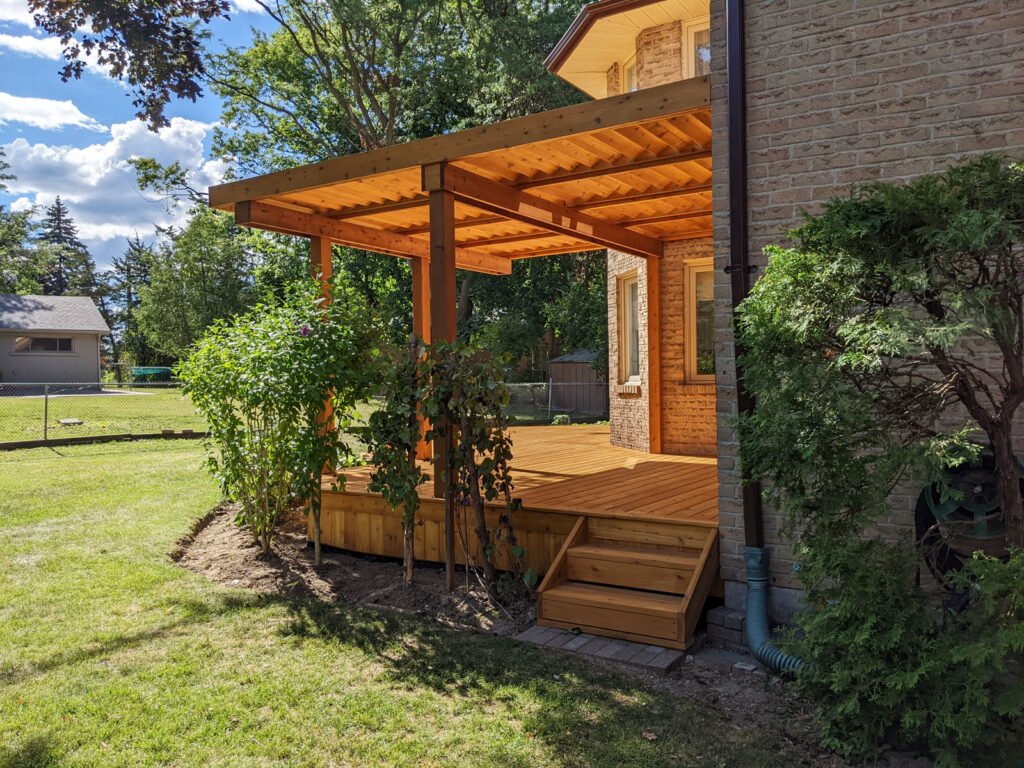 Low level cedar deck with louver pergola